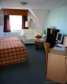 Strandhotel De Vassy Szálloda